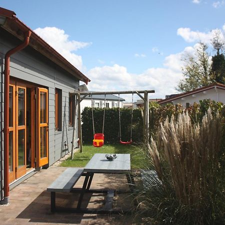 Villa Emilia - Gemuetliches Kinderfreundliches Blockhaus Mit Umzaeuntem Garten Sint-Annaland Extérieur photo